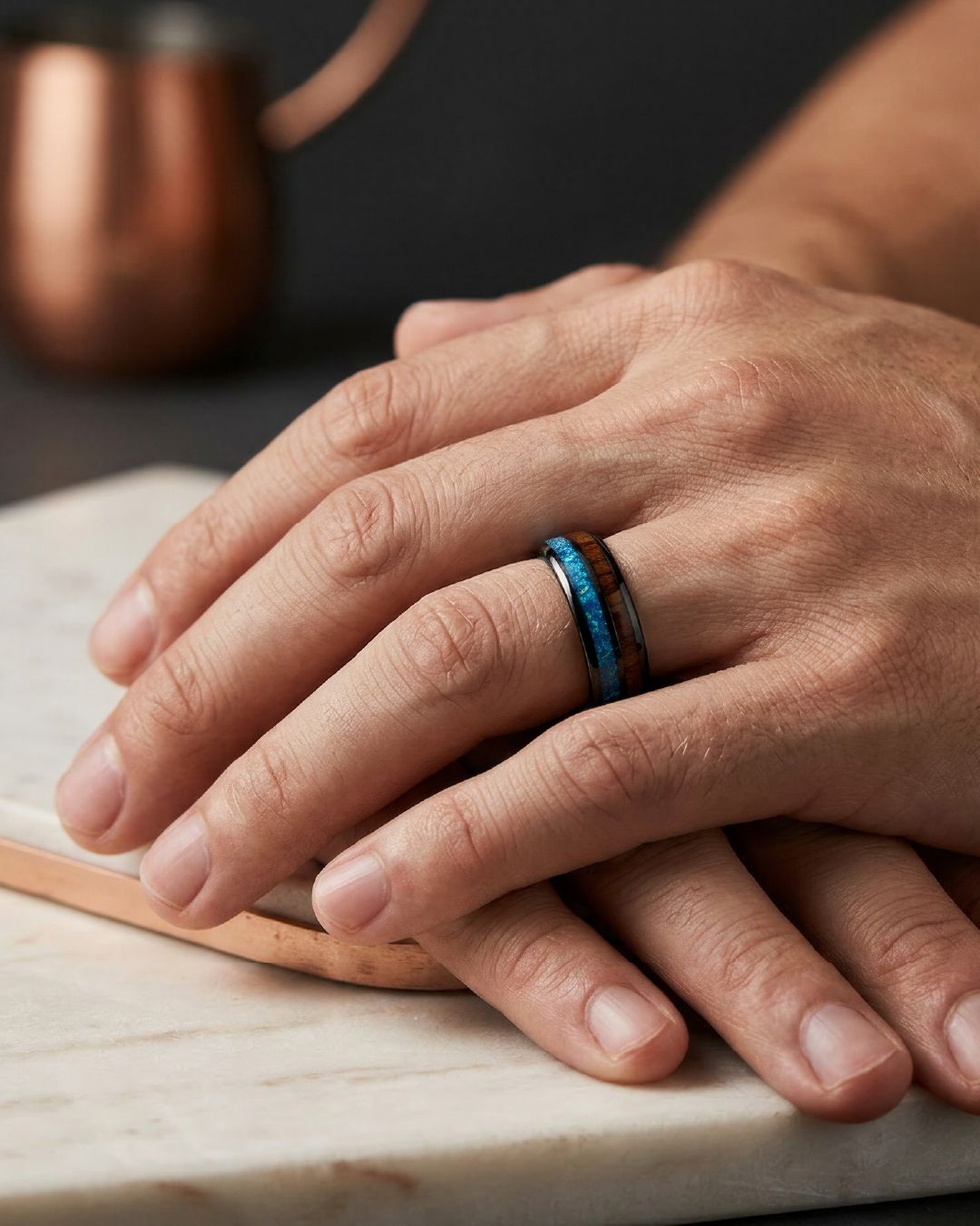 a close up of a person wearing a ring