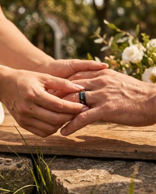 a man and a woman holding each other's hands