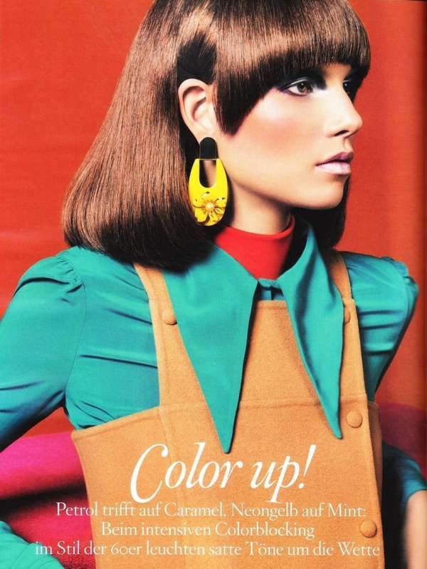 a woman is posing in an ad for color up magazine