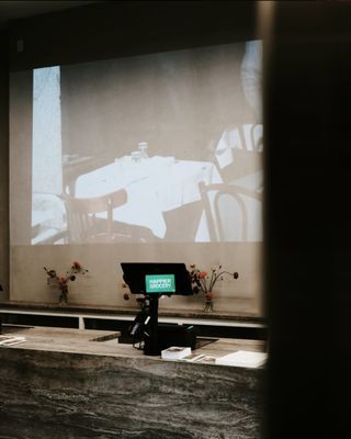 a projection of a table with a laptop on it