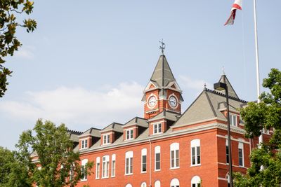 a red brick building with a clock tower