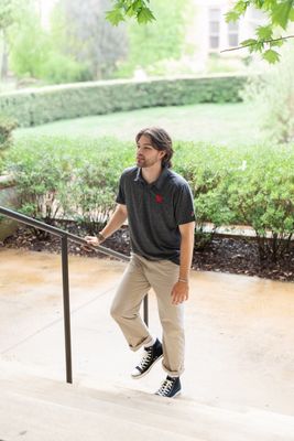 a man walking up a set of stairs
