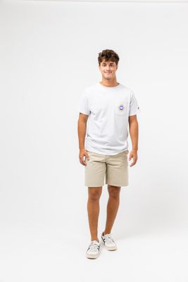 a man standing in front of a white background