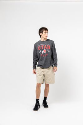 a man standing in front of a white background