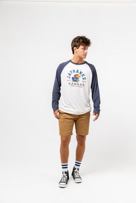 a man standing in front of a white background