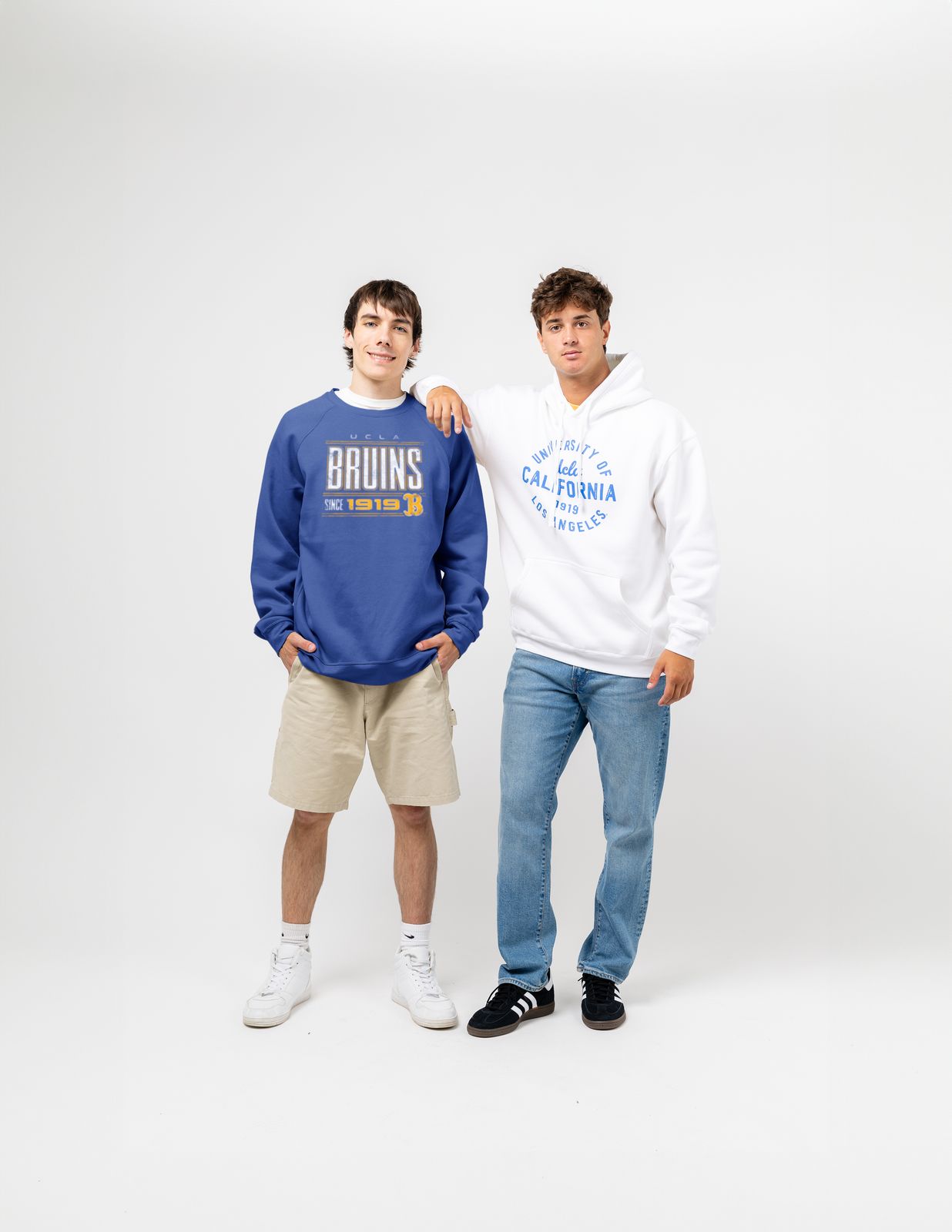 two young men standing next to each other