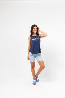 a woman posing for a picture in a tank top