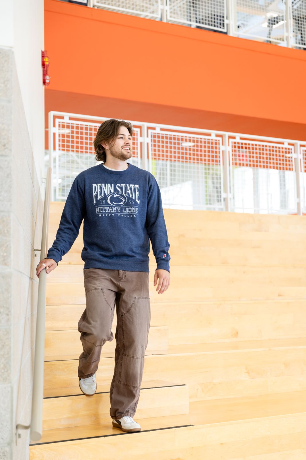 a man walking up a flight of stairs