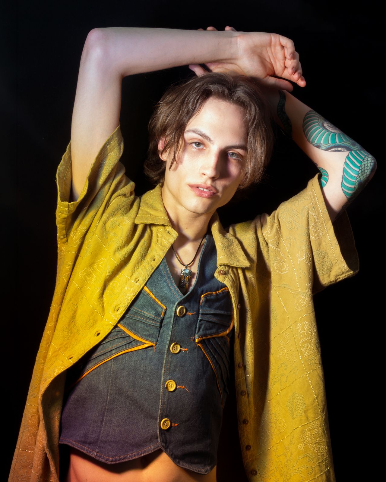 a woman with a tattoo on her arm