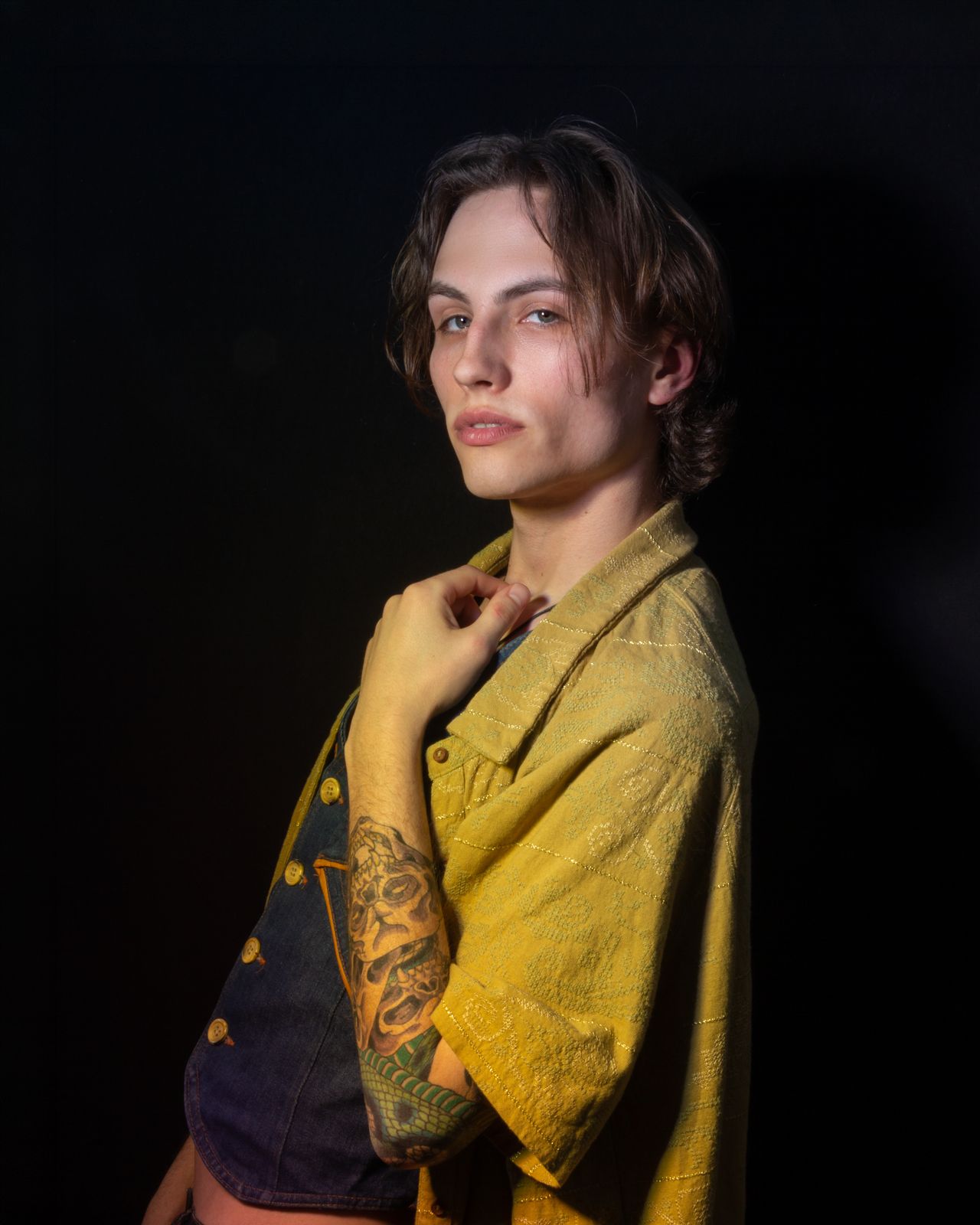 a woman with a tattoo on her arm