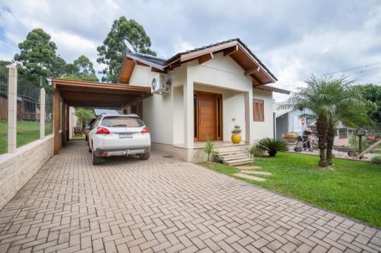 a car is parked in front of a house