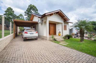 a car is parked in front of a house