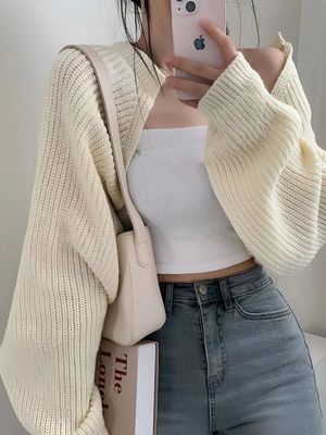 a woman taking a selfie with her phone