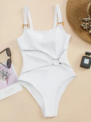 a white one piece swimsuit with a bow at the back