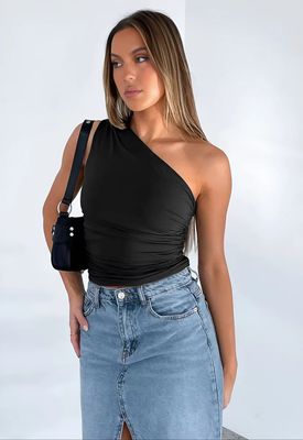 a woman wearing a black one shoulder top