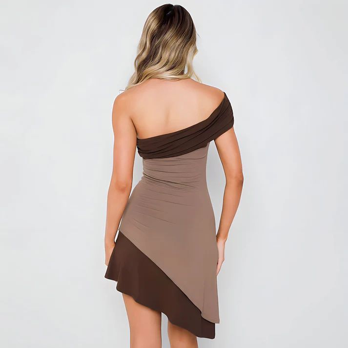a woman in a brown and brown dress