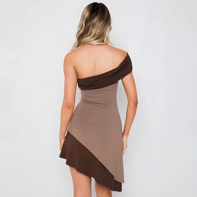 a woman in a brown and brown dress