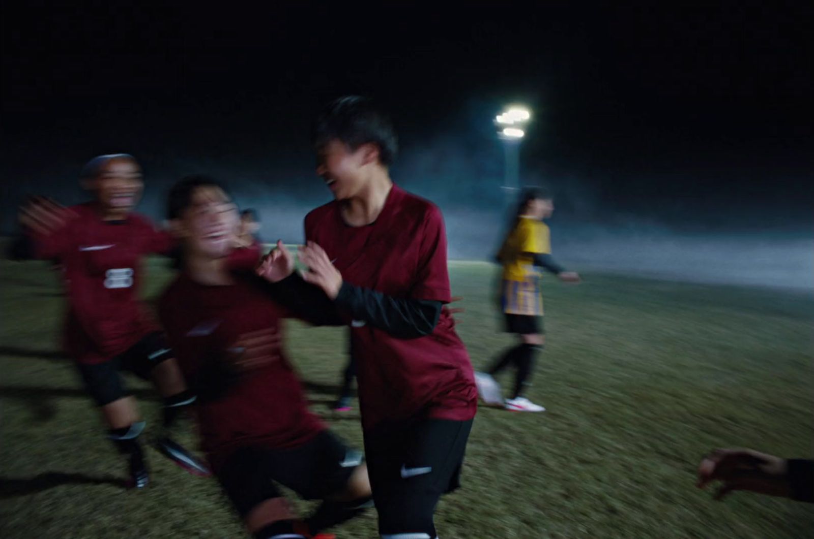 a group of young men playing a game of soccer