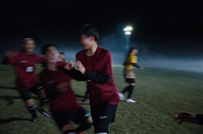 a group of young men playing a game of soccer