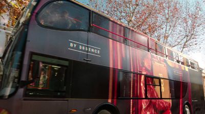 a double decker bus parked on the side of the road