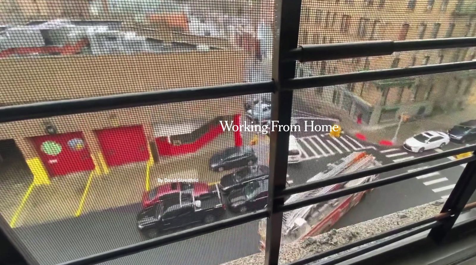 a view of a parking lot through a window