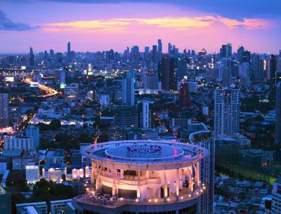 a view of a city at night from a tall building