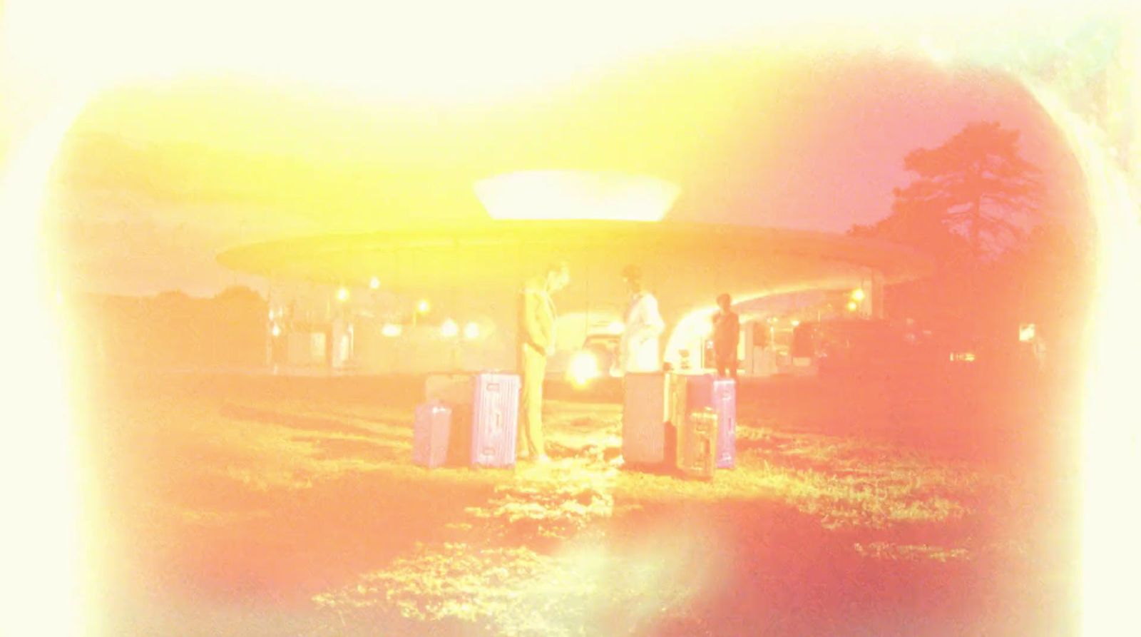 a couple of people standing next to each other