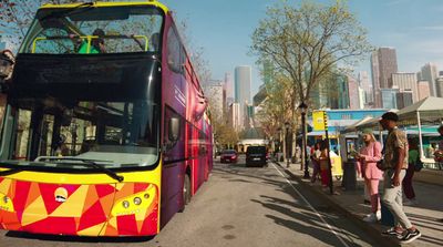 a double decker bus is parked on the side of the road