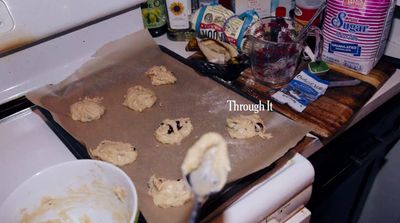 a kitchen counter with a cookie sheet on it