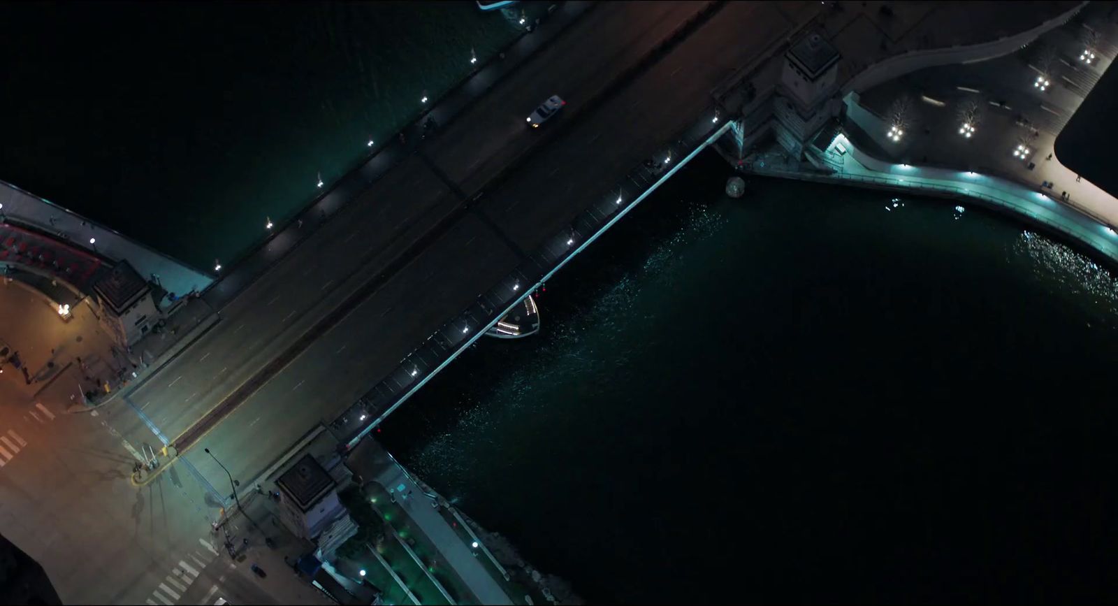 an aerial view of a bridge at night