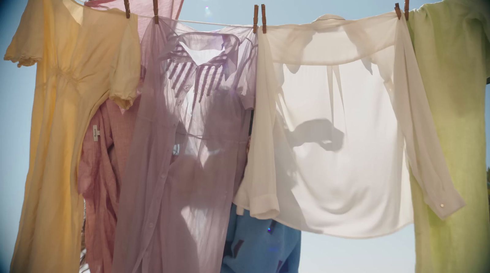 a line of clothes hanging on a clothes line