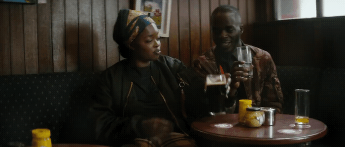 a man and a woman sitting at a table