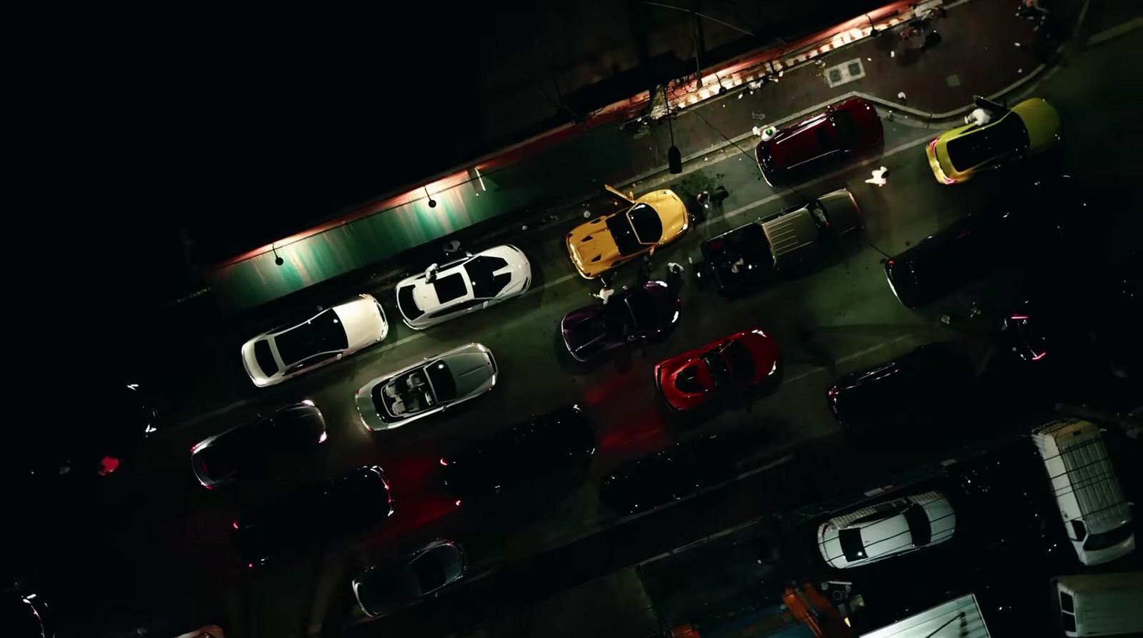 a bunch of cars are parked in a parking lot