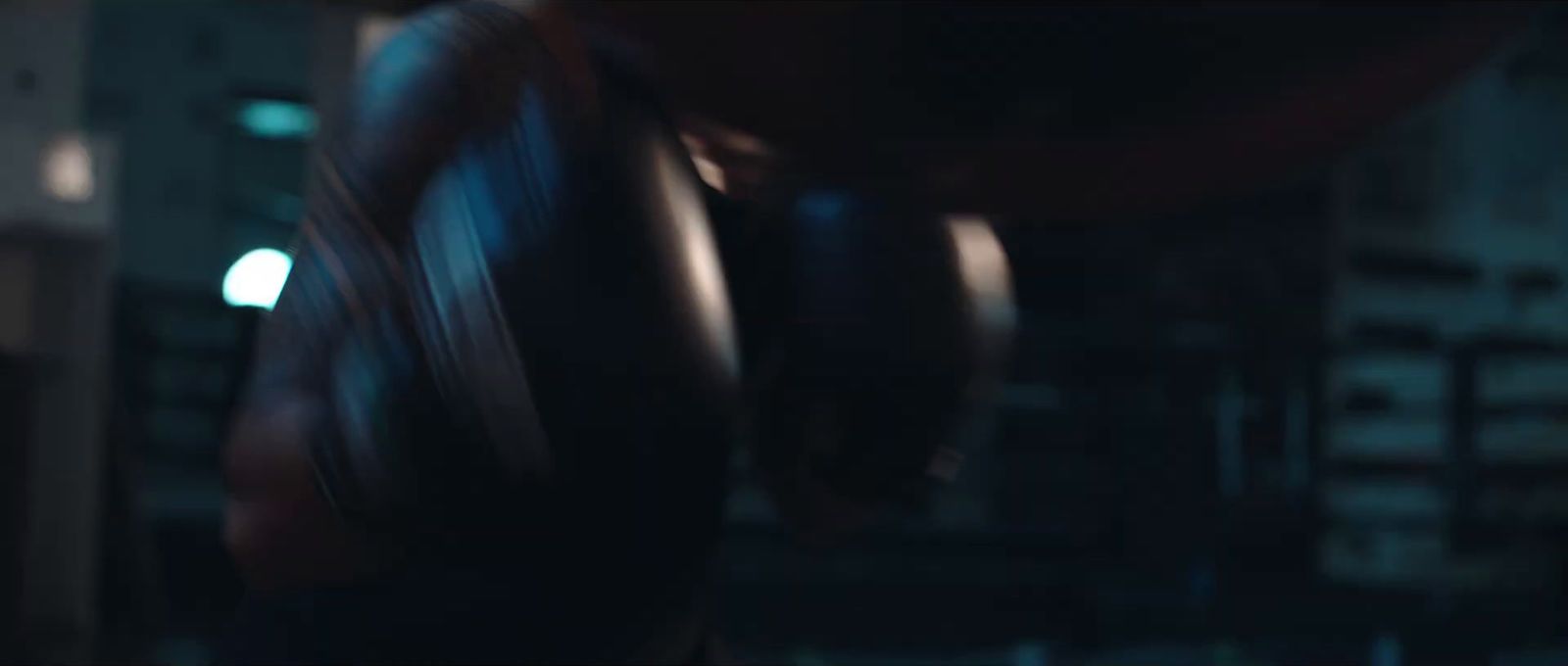 a blurry photo of a person wearing boxing gloves