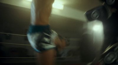 a blurry photo of a person in a boxing ring