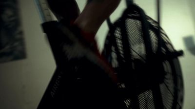 a person holding a tennis racket in their hand