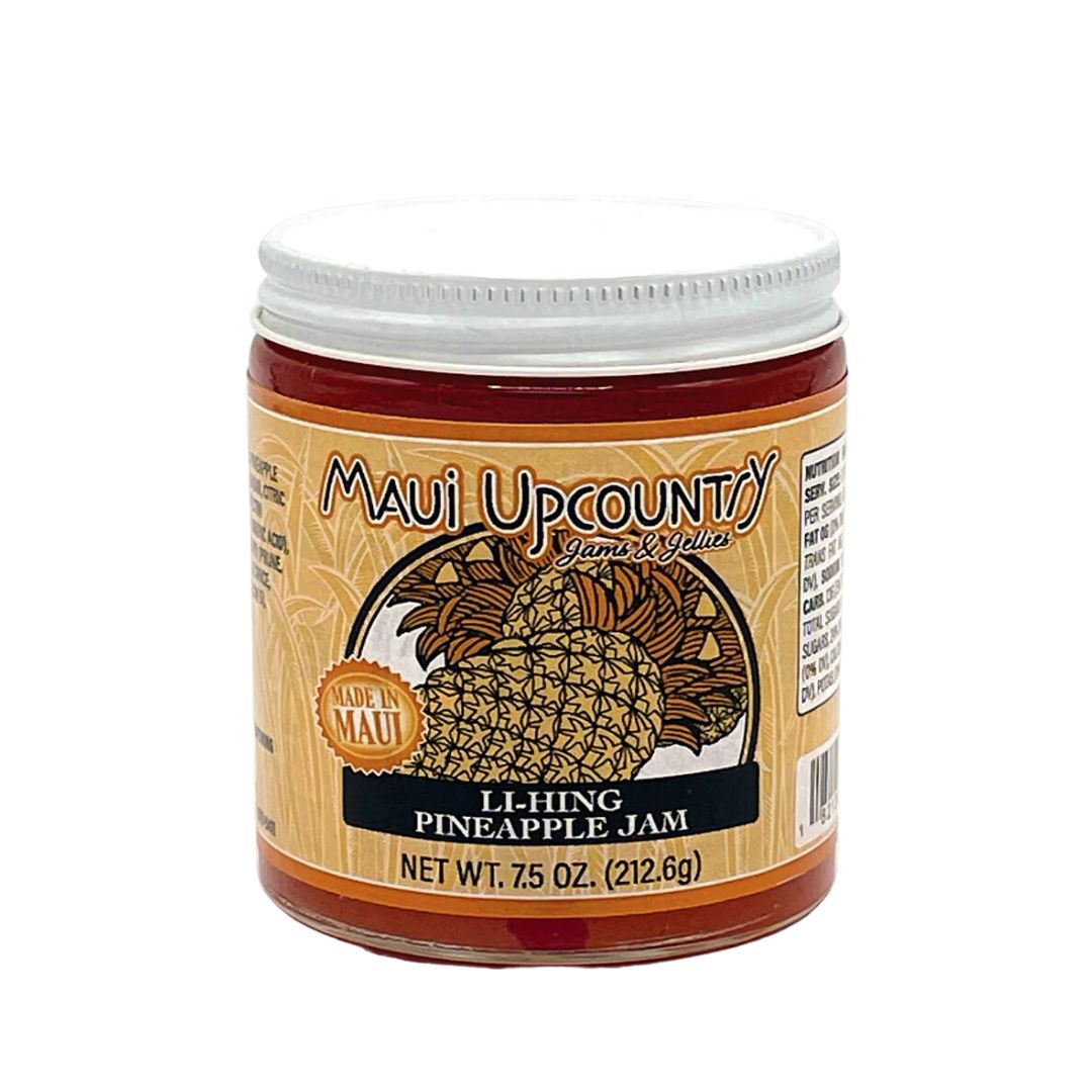 a jar of pineapple jam on a white background