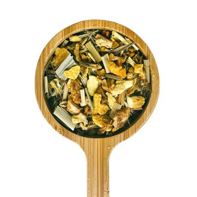 a close up of a wooden spoon with food in it