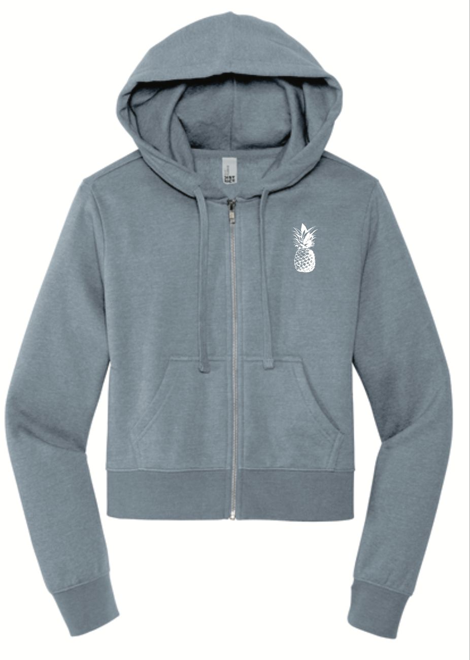 a women's sweatshirt with a pineapple embroidered on the front