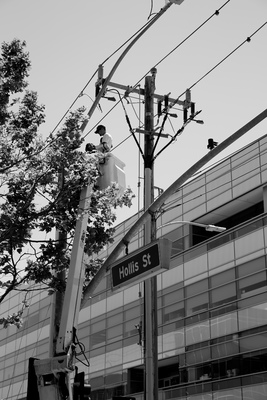 a black and white photo of a street sign