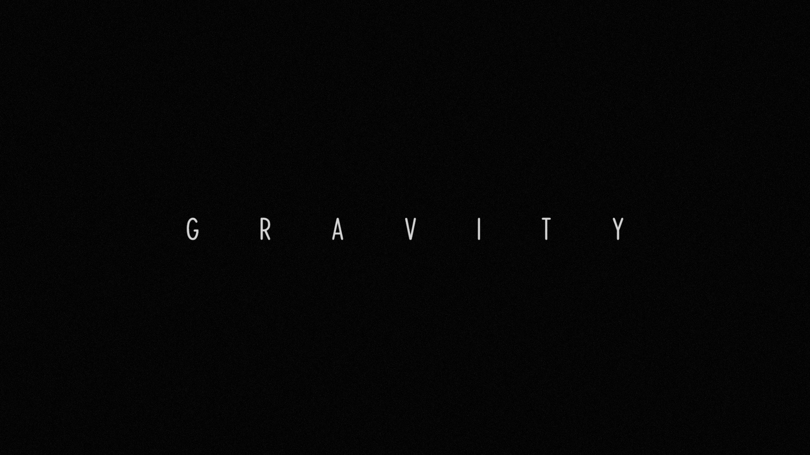 a black background with the word gravity written in white