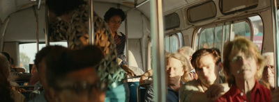 a group of people riding on a bus