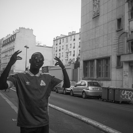 a man standing on the side of a road