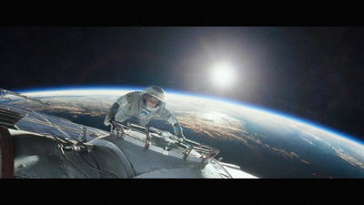 a man in a space suit climbing up the side of a space shuttle