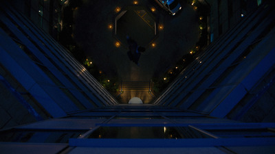 a view of an escalator at night from above