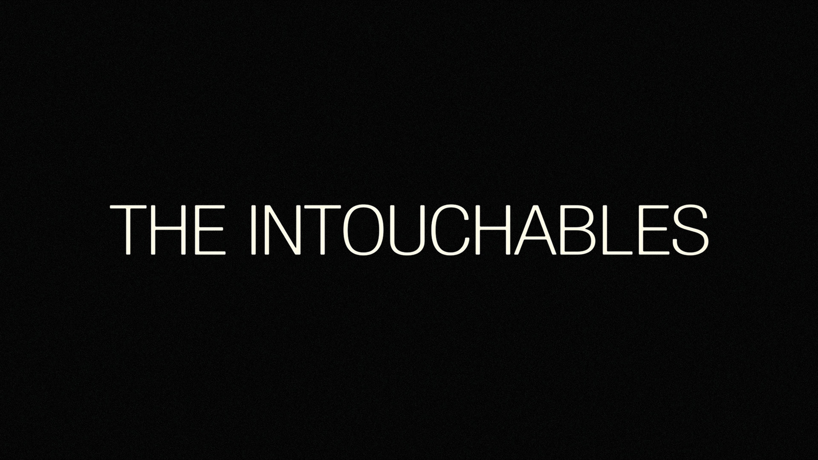 the intouchables logo on a black background