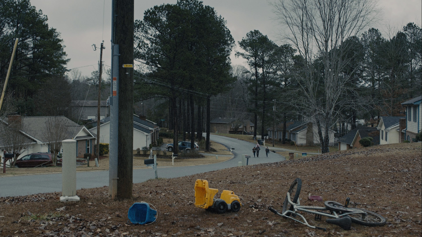 a pile of junk sitting on the side of a road