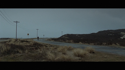 an empty road in the middle of nowhere