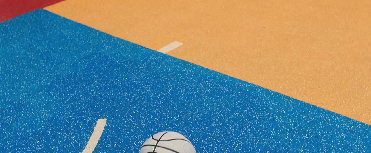 a close up of a basketball on a court