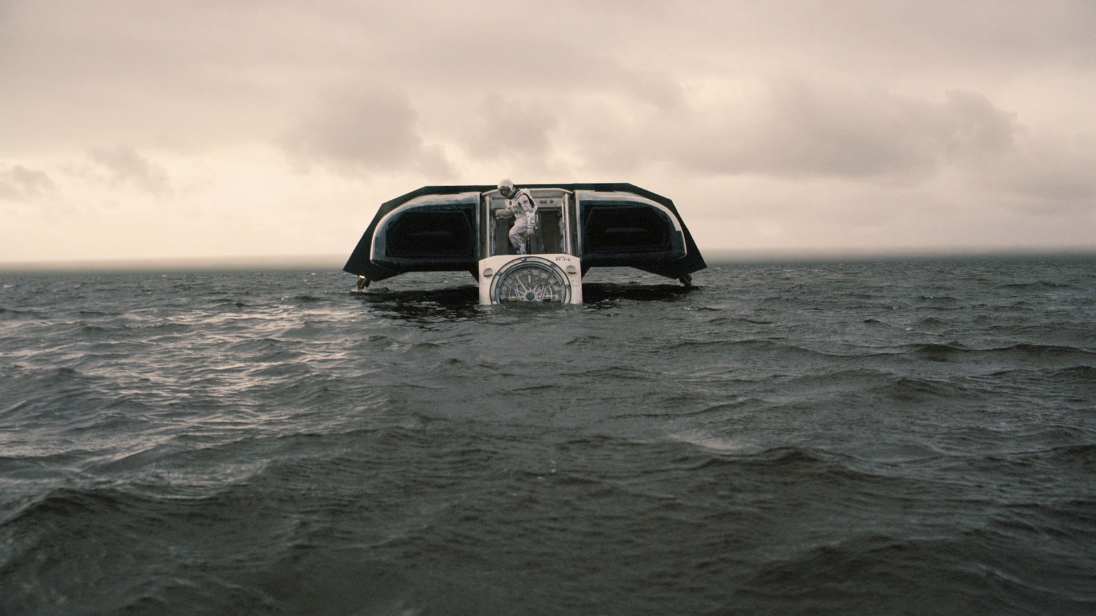 a boat floating on top of a large body of water